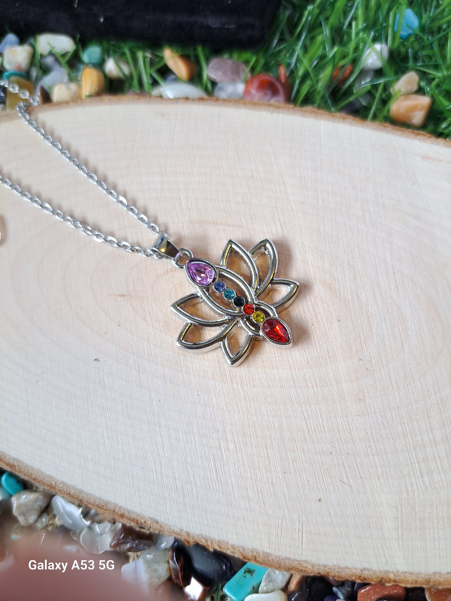 Chakra lotus pendant delicate necklace. The lotus flower pendant symbolizes purity, transformation, and spiritual enlightenment. Thus, this lotus chakra necklace can help you cleanse your aura from negative energy and encourage spiritual development.