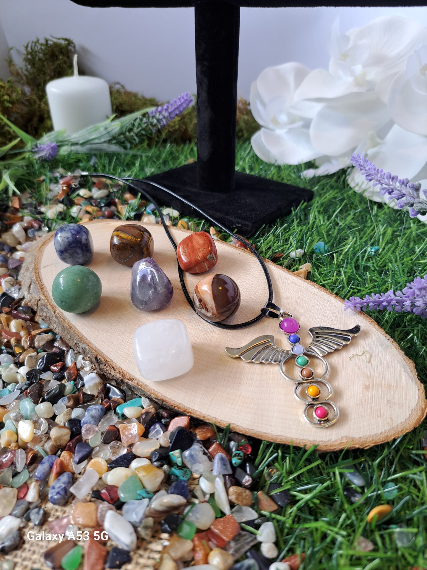 Chakra crystal sets include 7 chackra tumbling stones and a chakra medical symbol associated with healing, health and wisdom